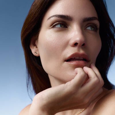 Three skinbetter science products lined up horizontally on a pale grey surface