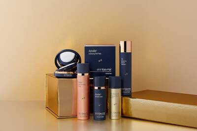 6 skinbetter science products posed against a gold background